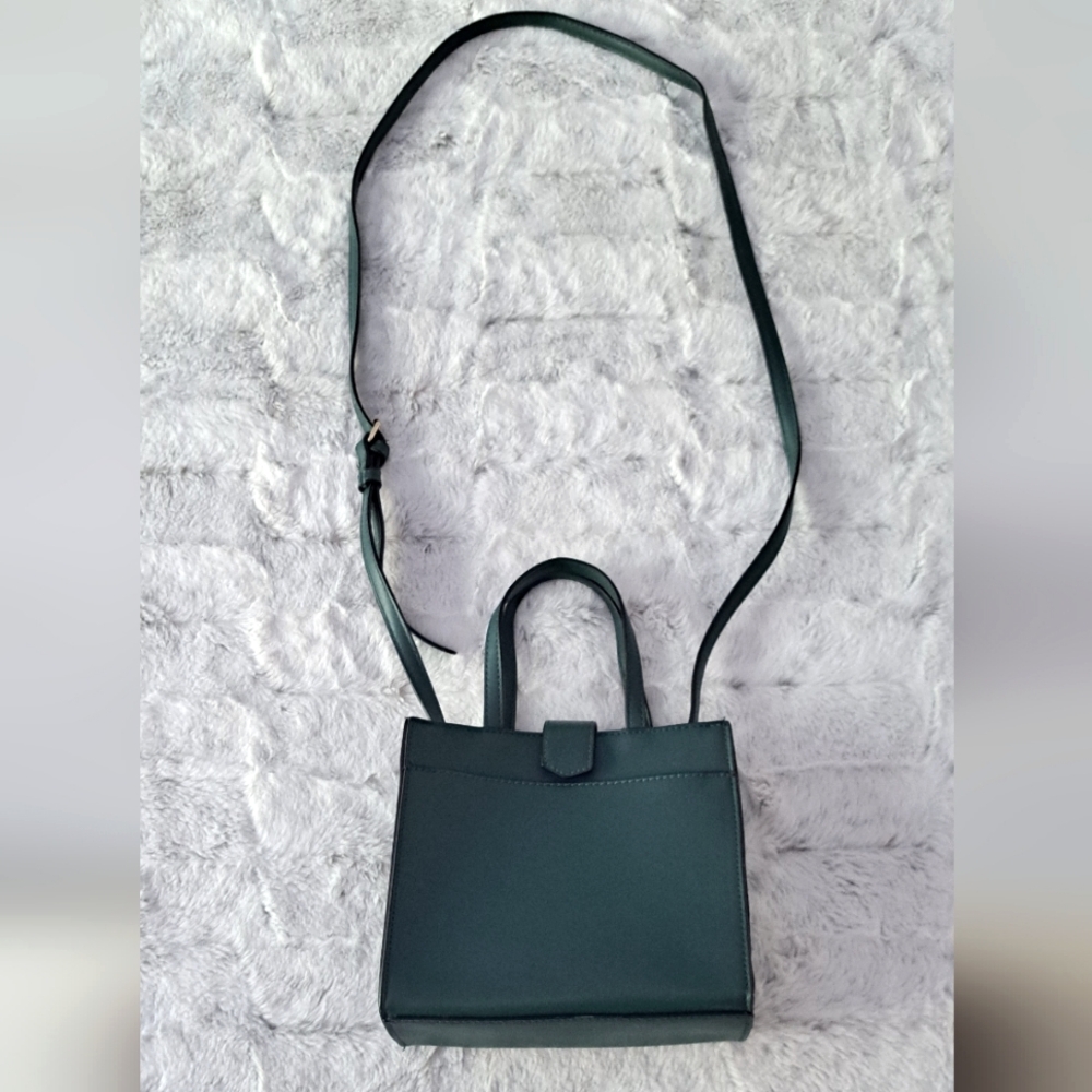 A New Day green cross-body snap closure purse..